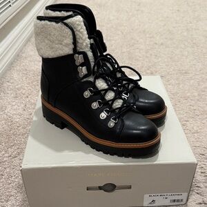 Brand new. Marc Fisher Black and Cream Winter Boots. Size 7.